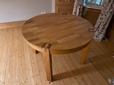 solid oak dining table and 4 matching chairs