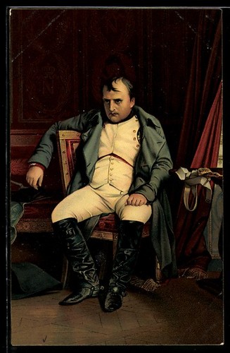 Napoleon sits thoughtfully - , on
