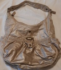 NICA Gold Handbag.