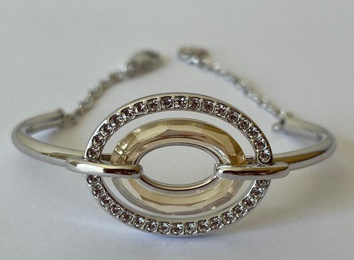 Swarovski signed logan golden - signed,
