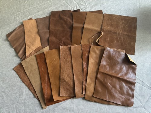 Tan brown leather pieces - leather,