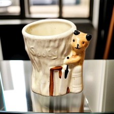 Vtg 50s Egg Cup modelled as Sooty playing cricket.Mark for Keele Street Poterry