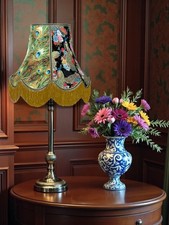 Proud peacock feathers table