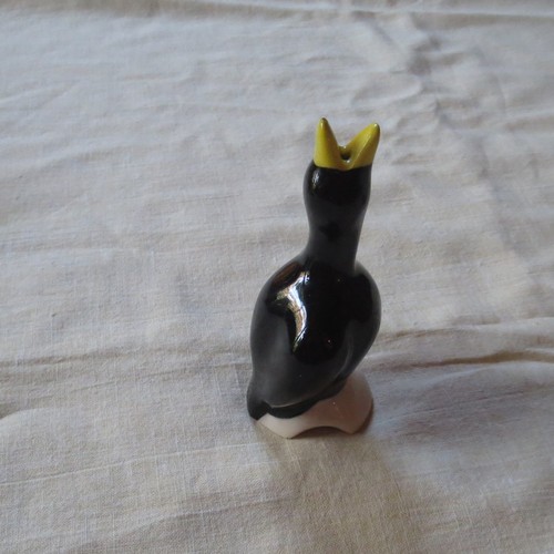 Glossy ceramic blackbird with - ,