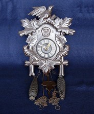 A broken old wall cuckoo clock