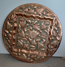 Large vintage copper tray with floral design and pierced background