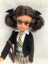 Brunette Pedigree Sindy doll dressed as a schoolgirl