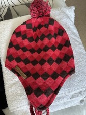 Berghaus bobble  hat with plaits - pink/red/grey Diamonds