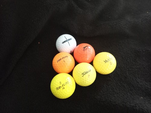 Coloured golf balls in - balls,