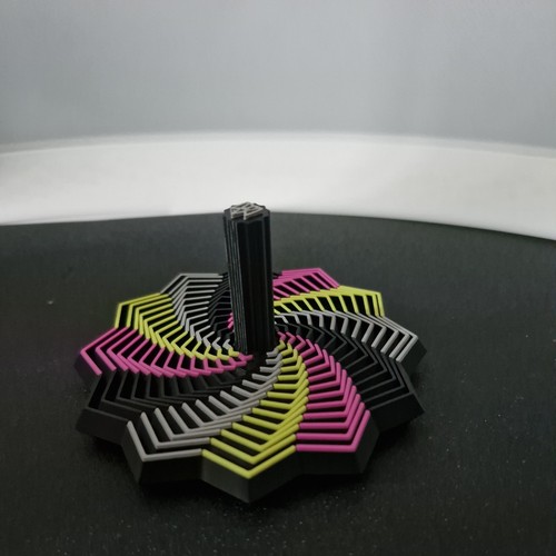 Kinetic spinning top - kinetic,