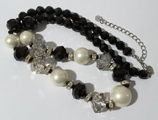 Marks & Spencer black glass