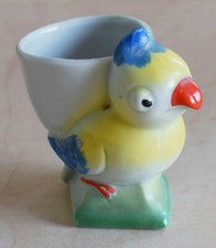 BIRD EGG CUP FOREIGN - YELLOW BLUE PARROT ORANGE BEAK DIAMOND SHAPE GREEN BASE