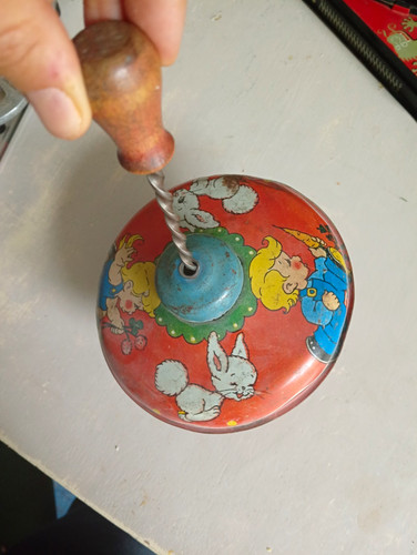Vintage tinplate spinning top - spinning,