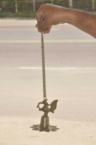 Old brass handcrafted peacock - old,