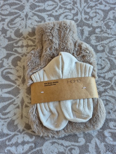 Hot water bottle and socks - and,