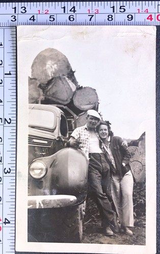 Man woman logging truck trees - truck,