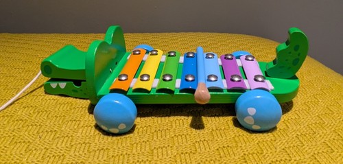 Green wooden pull along - green,