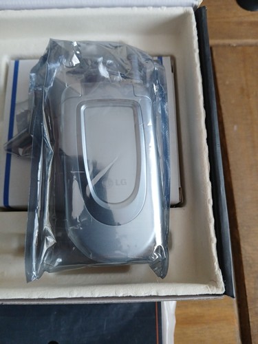 Mobile phone orange flip - phone,