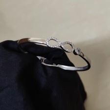 Round Cut Moissanite Infinity Shape Bangle Bracelet Solid 14K White Gold Plated