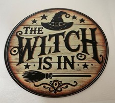 The Witch Is In Metal Sign