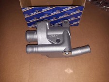 NEW THERMOSTAT HOUSING CAP