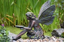 Fairy sitting Garden ornament