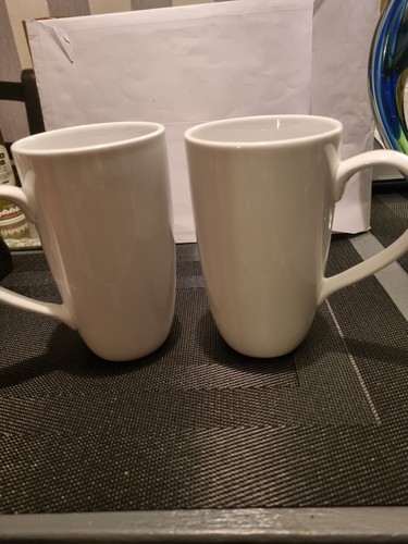 Two pure white - porcelain, mugs