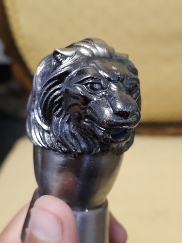 Antique lion head liquor - antique,