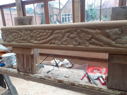 Hand carved stone fireplace - hand,