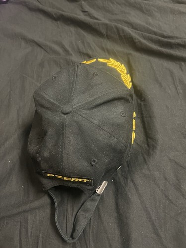 Black and yellow pirelli hat - a,