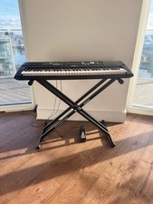 Black Yamaha Keyboard EZ-220