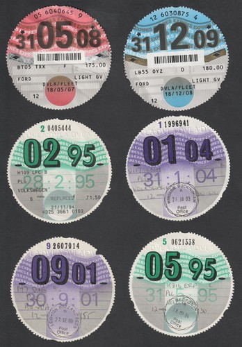Six used tax discs disc - used,