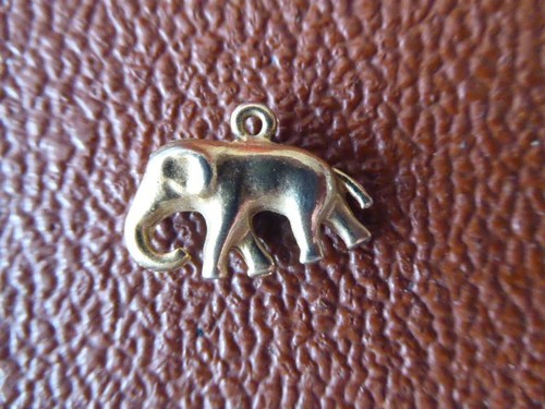 Elephant gold tone charm - gold,