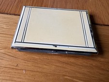 Art deco compact with self - compact,