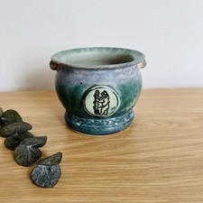 Conwy Pottery Welsh studio pottery planter green glaze medallion motif