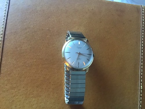 Vintage gold toned timor - vintage,