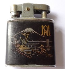 A Vintage Komai style cigarette lighter. Made in Japan probably in the 1920s.