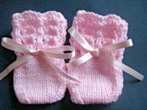 Lovely hand knitted baby - hand,