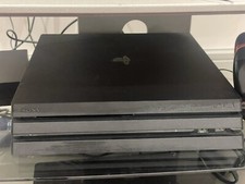 Sony PS4 PRO 1TB Console - Black With 2x Controllers & Charging Station. 9 Games