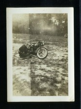 Man Working on His Bike in a