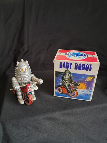 Vintage wind tin toy - up,