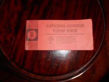 vintage national savings stamp book with fifty stamps