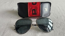 Police black and silver frame polarized sunglasses. S 8299.