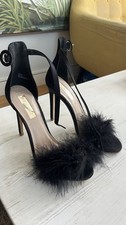 Brand new fluffy black high