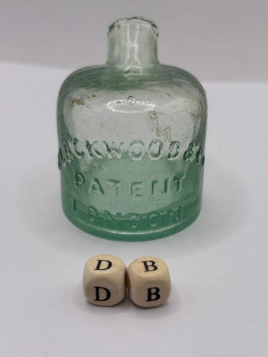Old advertising inkwell