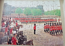 VICTORY HAND CUT WOODEN JIGSAW PUZZLE - TROOPING THE COLOUR.  APPROX. 80 PIECES