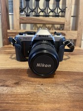 Nikon FM10 SLR, 35-75mm Lens, Leather Case, & Camera Bag | Great Condition