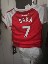 Hey, I've got three Arsenal baby t-shirts & Shorts, size 9-12 months, red.