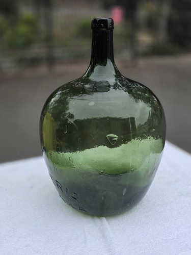 Embossed barcelona carboy - embossed, es