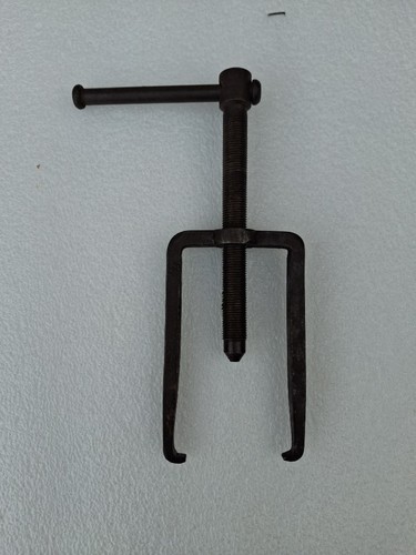 Gear and bearing puller - and,